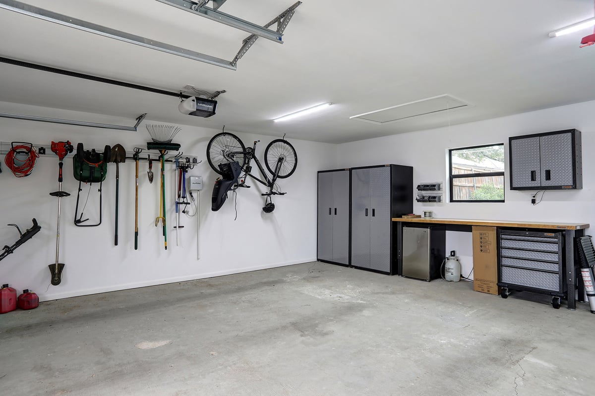 Inside Garage with self storage and hanging tools